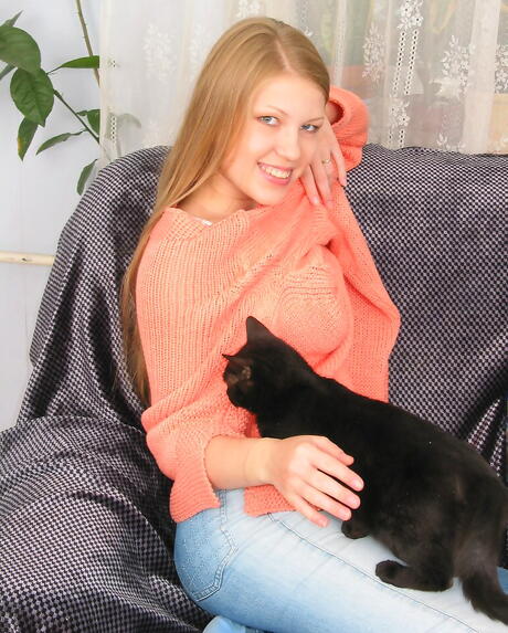 Gracile teen Marina undressing and revealing big boobies 